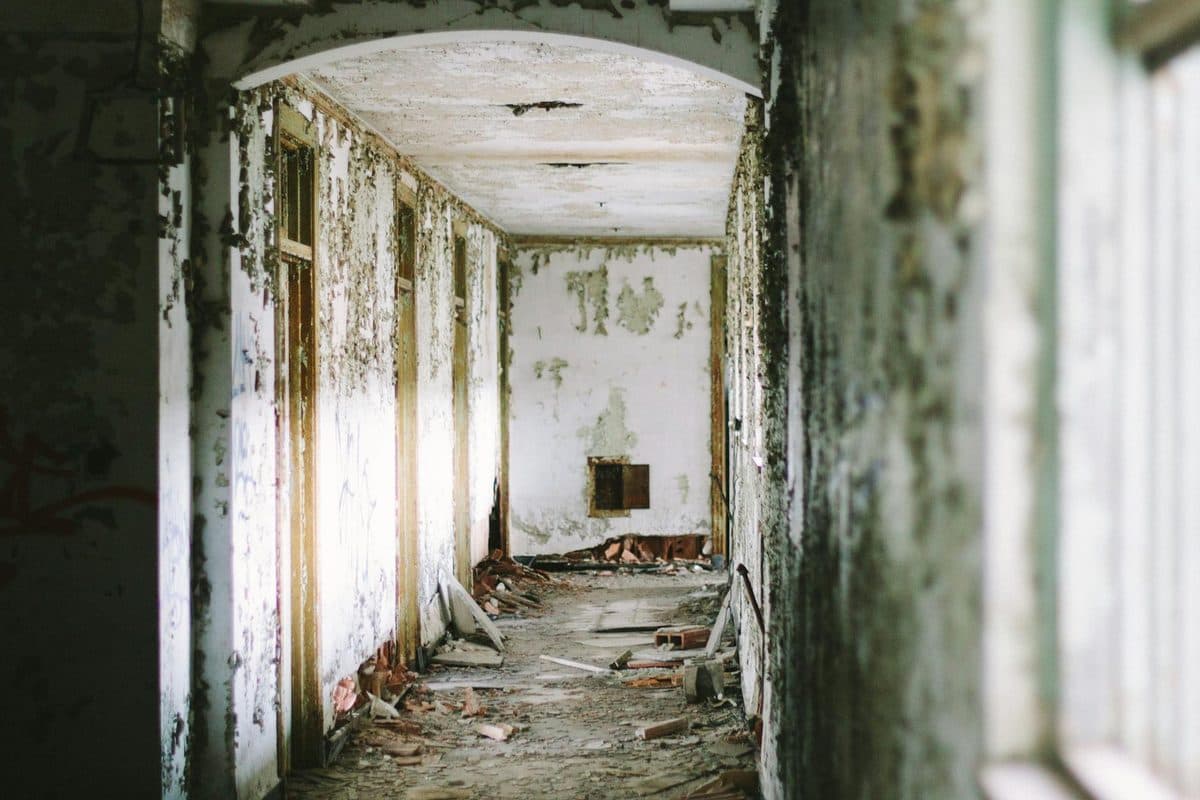 Eerie abandoned hallway in decay